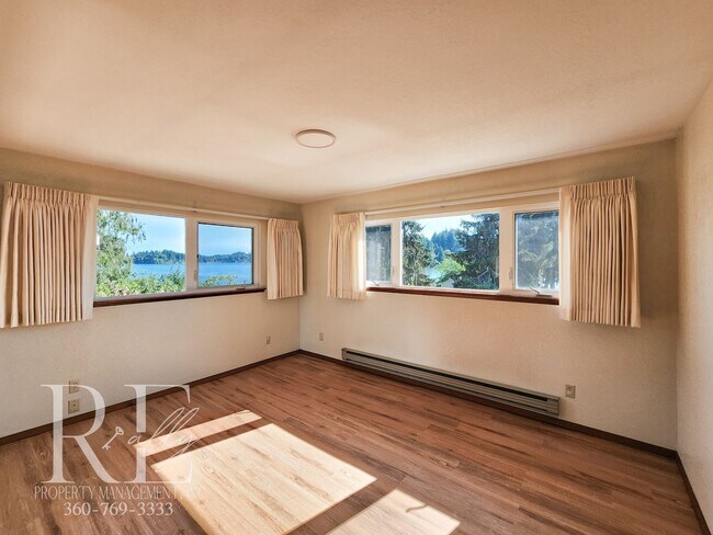 Building Photo - Waterfront Views & Peaceful Living – 2BR w...