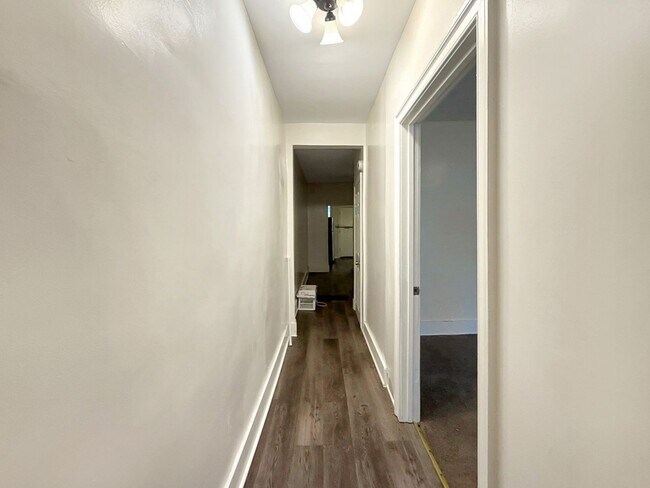 Building Photo - Charming Baltimore Rowhome with Updated Kitchen, Covered Front Porch & Basement