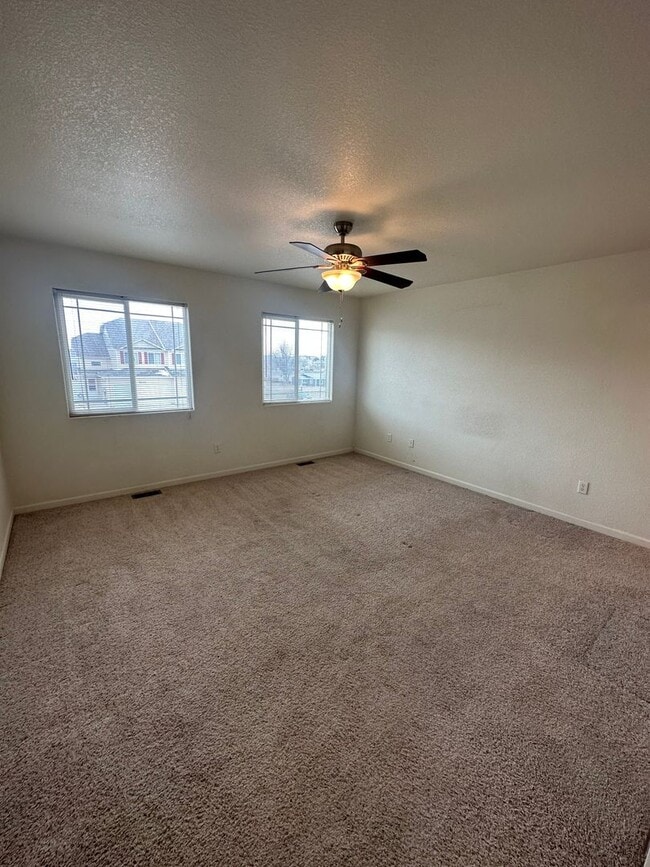 Building Photo - 3 BEDROOM, 2.5 BATHROOM TWINHOME WITH 2 CAR ATTACHED GARAGE