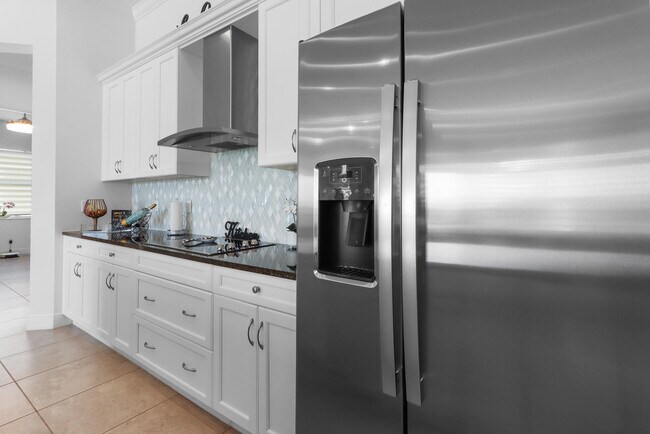 Building Photo - 9282 SW Miracoli Wy