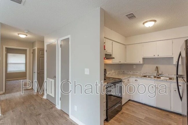 Building Photo - Town Creek Apartments