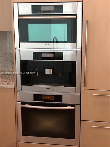 Building Photo - Asia Condo Unit