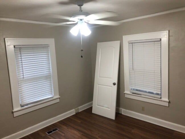 Building Photo - Freshly Painted 2x1 with Brand-New Plank F...