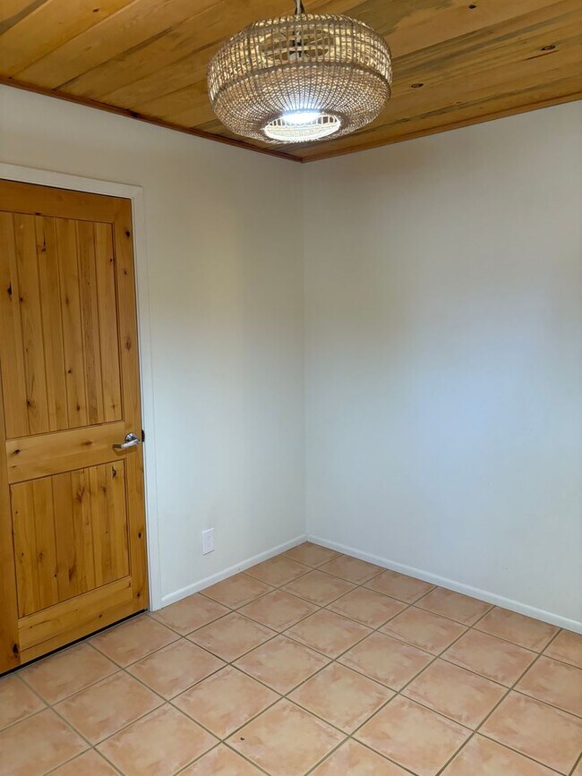Building Photo - Unfurnished, 6 month minimum rental