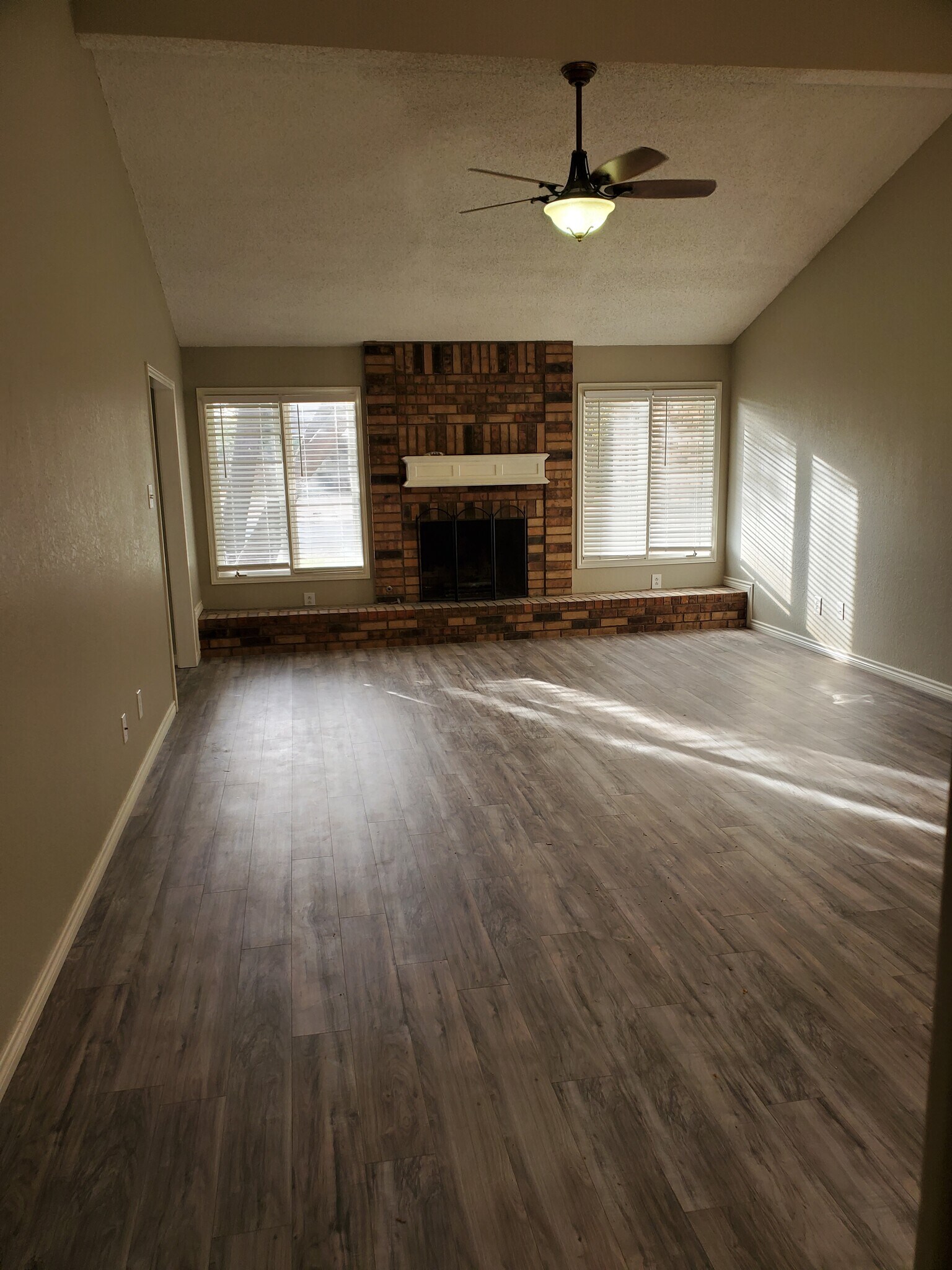 Living area with vaulted ceilings - 106 N Troy Ave