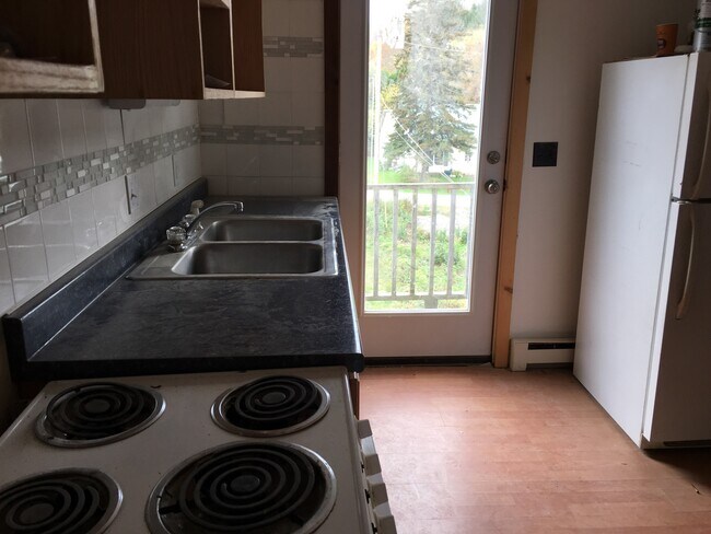 Building Photo - Johnson Village Apartments, LLC
