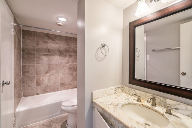 Building Photo - Stunning 1 Bed 1 Bath Condo In Popular High-Rise Fountains Building - Utilities Included