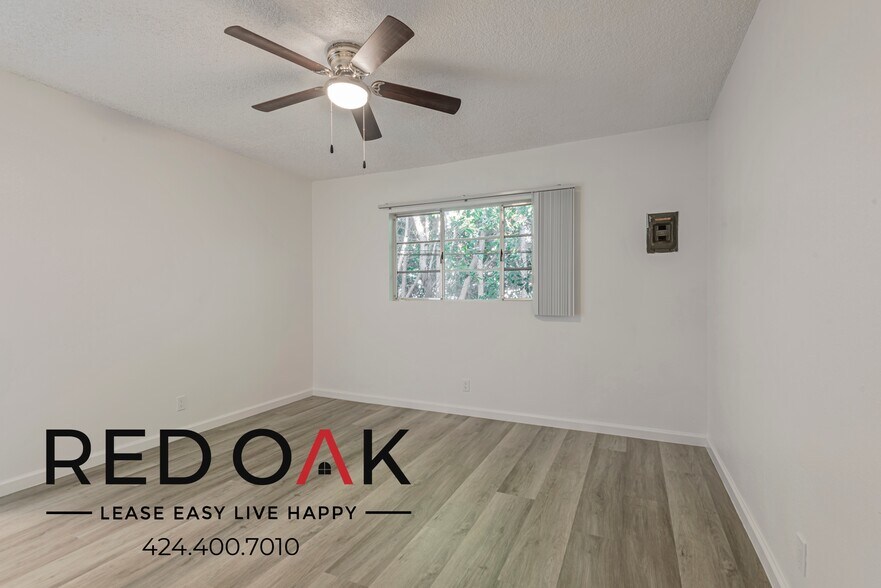 Building Photo - 15901 S Vermont Ave