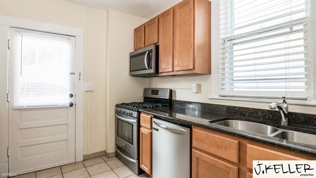 Building Photo - 4 br, 2 bath House - 221 W Mosley St