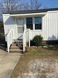 Building Photo - 709 Eva Cir