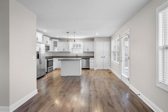 Building Photo - Pet Friendly Three Bedroom with Bonus!