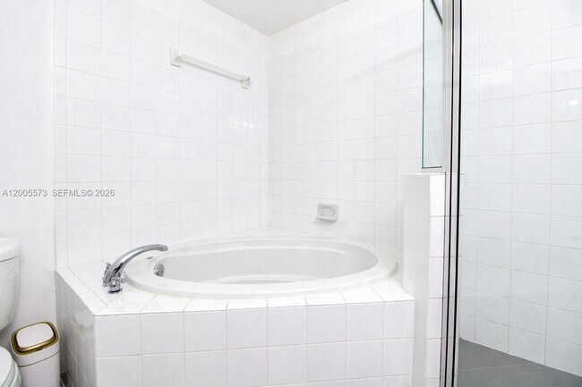 Building Photo - Northeast 8th Avenue, Miami Shores, FL 33138 - 2 BR 2 BA townhouse