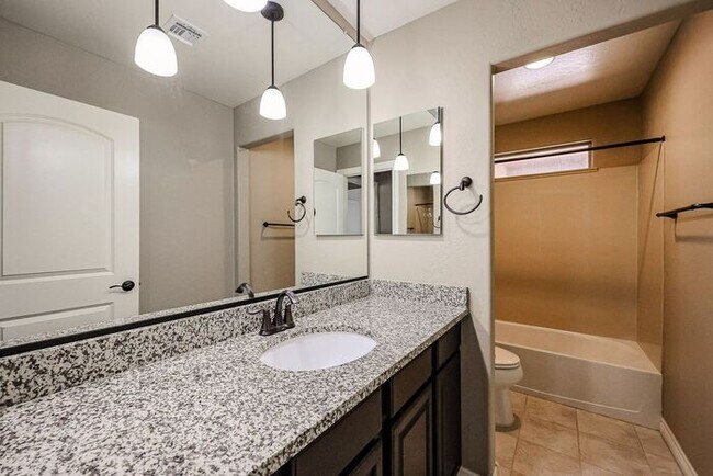 Building Photo - COMING SOON! Great Location!Stunning 6-bedroom Plus 7, 4.5-bathroom home located in Chandler