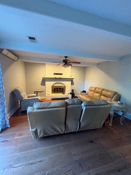 Lower level 2nd living room with fireplace - 10300 W 48th St