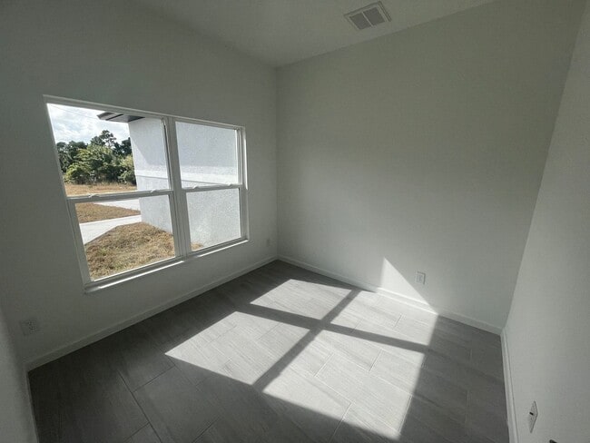 Building Photo - NEW CONSTRUCTION-Spacious 4 Bed / 2 Bath / 2 Car Garage Home in Lehigh Acres