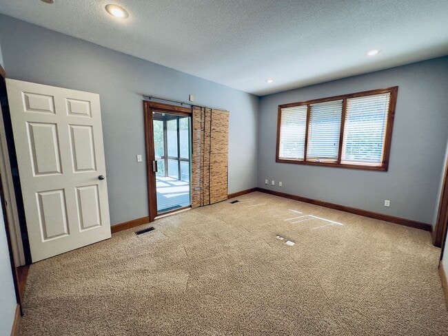 Building Photo - {6411} Enchanted Lake Estates + Updated Kitchen, Fresh Paint Throughout +  Main Floor Primary Bed...