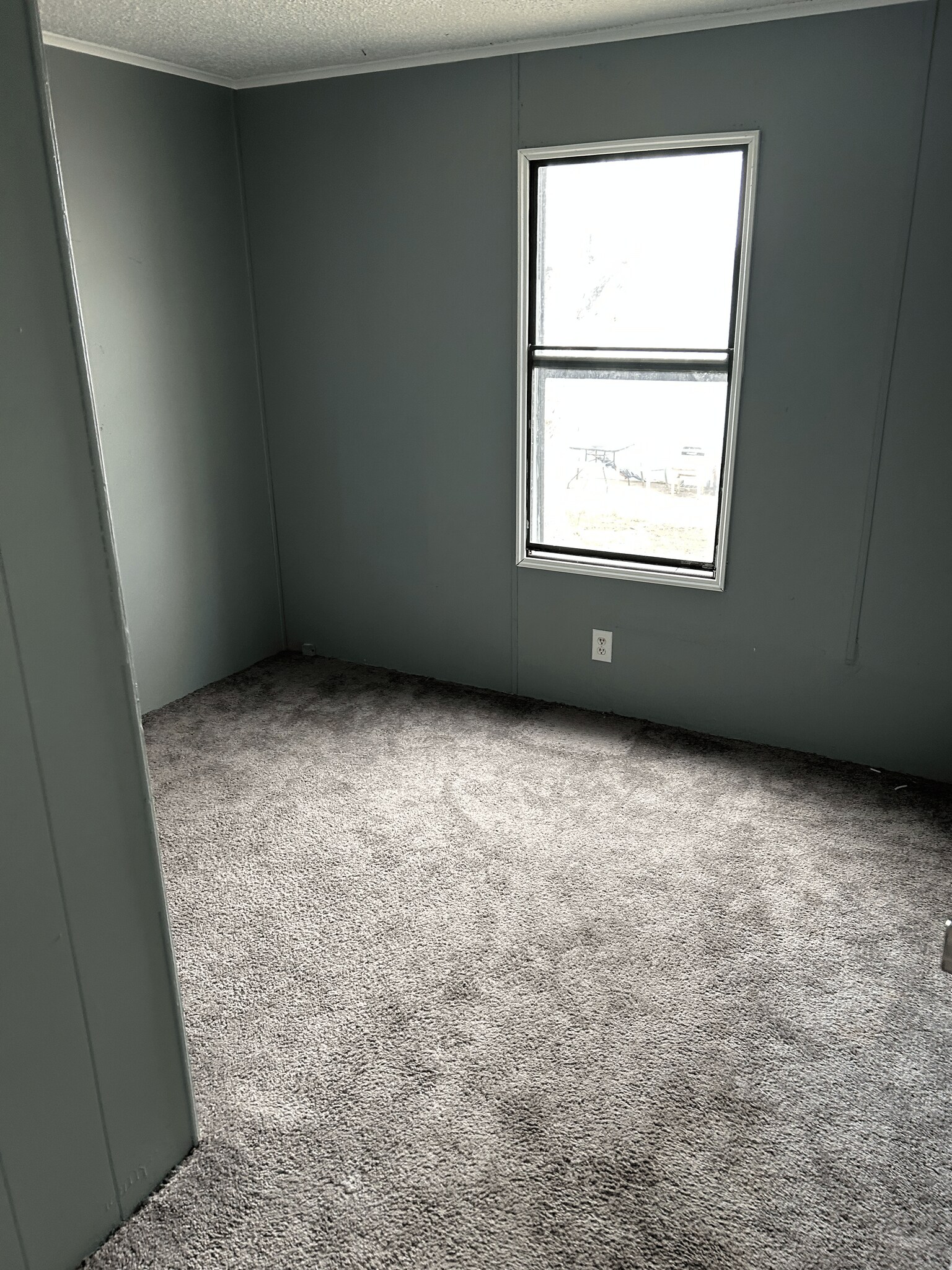 Building Photo - 7601 N Hwy Vv