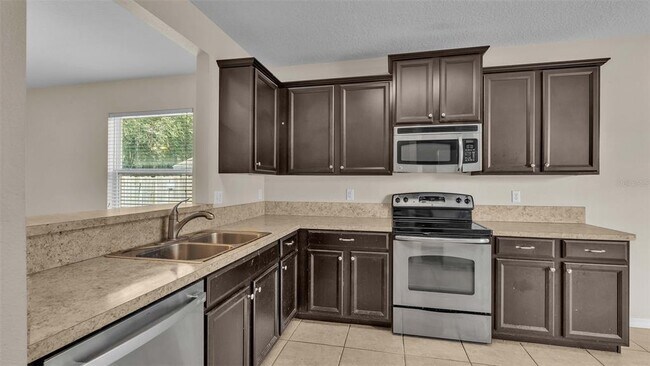Building Photo - 6838 Glenbrook Dr
