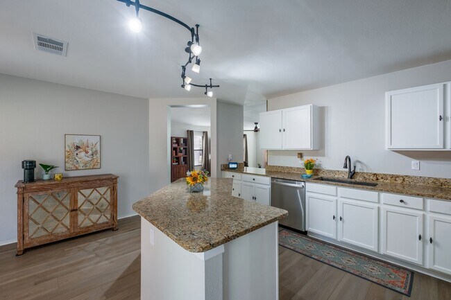 Building Photo - Patio Living with Basketball Court