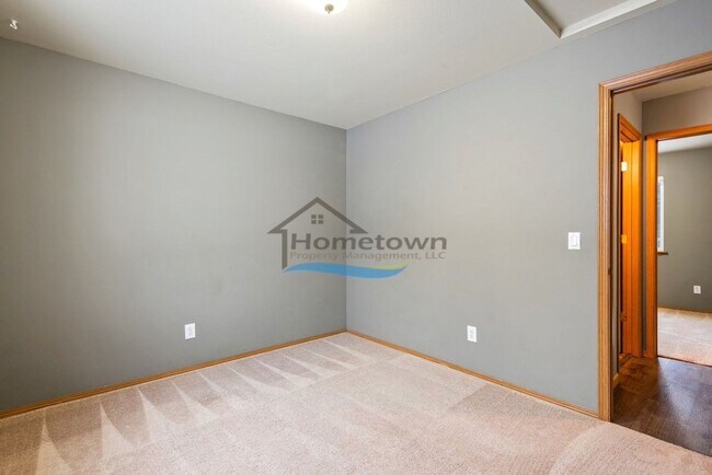 Building Photo - Sweet 2 Bed 1 Bath House with a Fenced Yard in Post Falls!