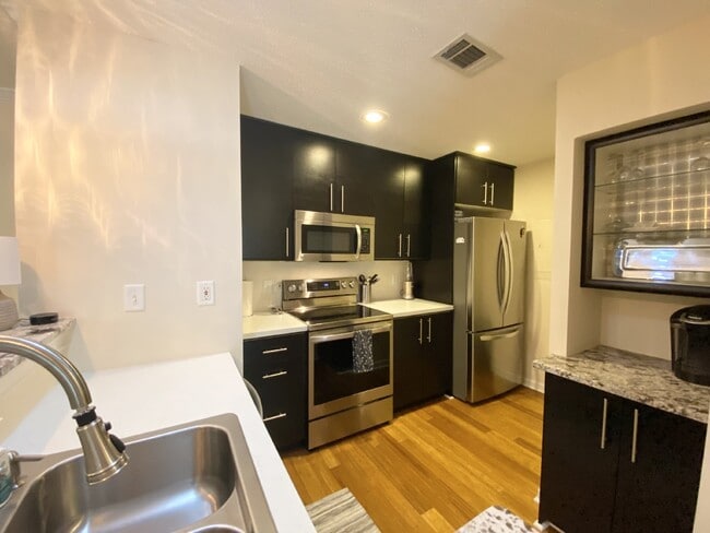 Building Photo - Furnished Two Bedroom Condo in The Reserve at Woodbridge.