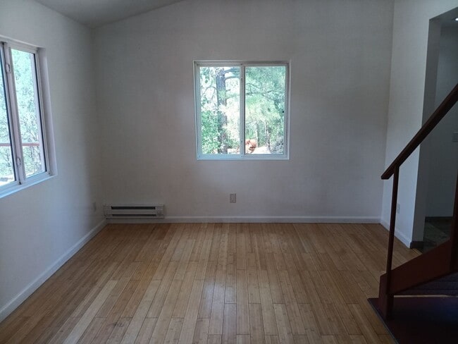 Building Photo - COZY HOME IN THE BEAUTIFUL TOWN OF TIJERAS | Showings available NOW!!