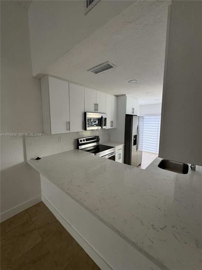 Building Photo - 8341 SW 148th Pl