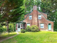 Building Photo - Asheville - Historic Charm Meets Modern Living!