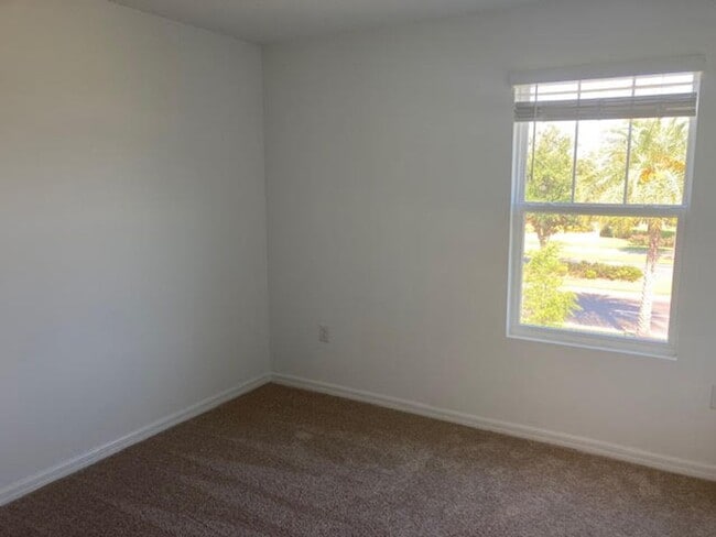 Building Photo - Immaculate 3/2.5 townhouse in Randal Walk Community of Lake Nona Area (Gated)