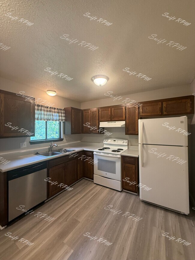 Building Photo - 12915 W 61st Terrace