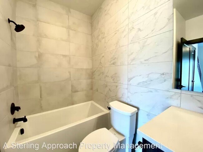 Building Photo - Close to Micron! Luxury Town Home With Two...
