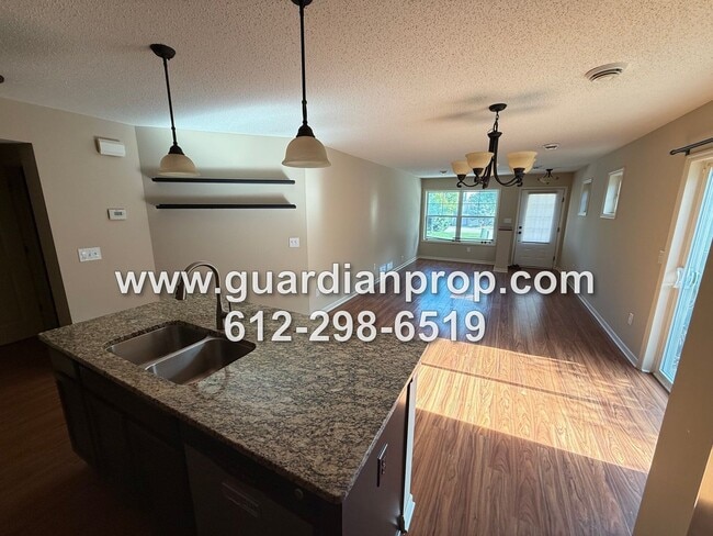 Building Photo - End Unit Townhouse Available Now, Loft Area, Large Primary Suite, Private Side Patio
