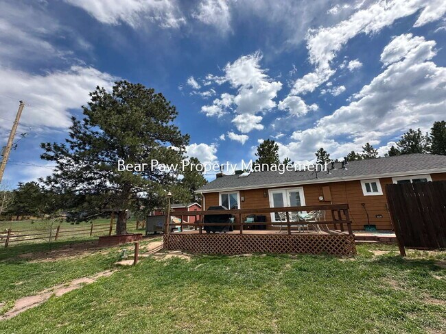 Building Photo - "Charming 3-Bedroom Retreat in Scenic Evergreen!
