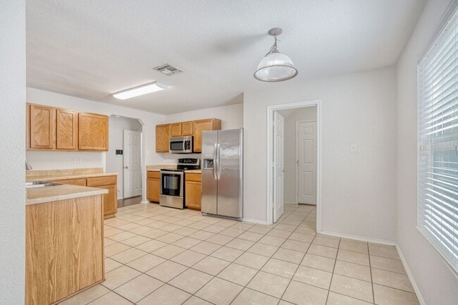 Building Photo - Charming & Spacious 4 Bedroom 2 and Half bath Home with Open Living, Modern Updates, and Private ...