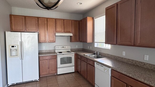 Building Photo - Updated 4/2.5 House with Garage in Turtle Creek of Saint Cloud