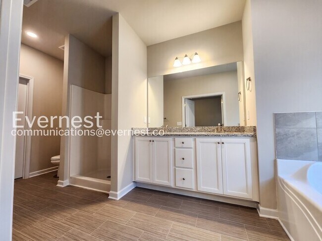 Building Photo - 4-Bedroom Home with Attached Garage / Pet-Friendly / Coming Soon!