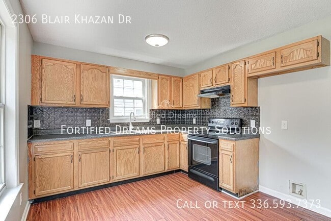 Building Photo - 2306 Blair-Khazan Dr