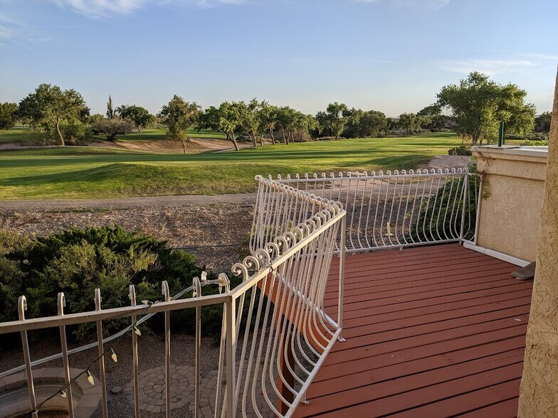 Large deck facing out to the golf course. - 6424 Saint Josephs Ave NW