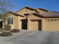 Building Photo - Unfurnished four bedroom large home!  Three car garage