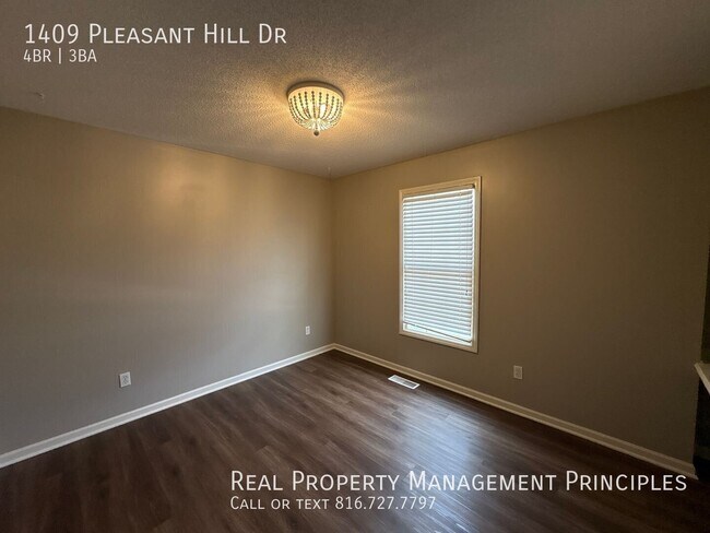 Building Photo - 1409 Pleasant Hill Dr