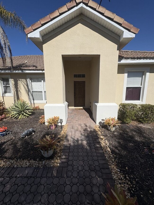 Building Photo - Florida Living Starts Here — Gated, Single-Story, Move-In Ready May 1!