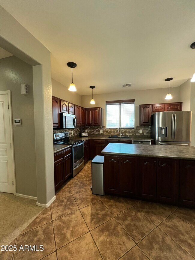 Building Photo - 14711 W Riviera Dr