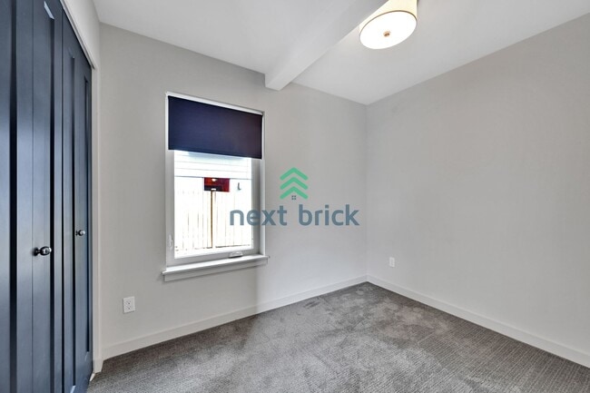 Building Photo - Sleek and Spacious Townhome with Gourmet K...