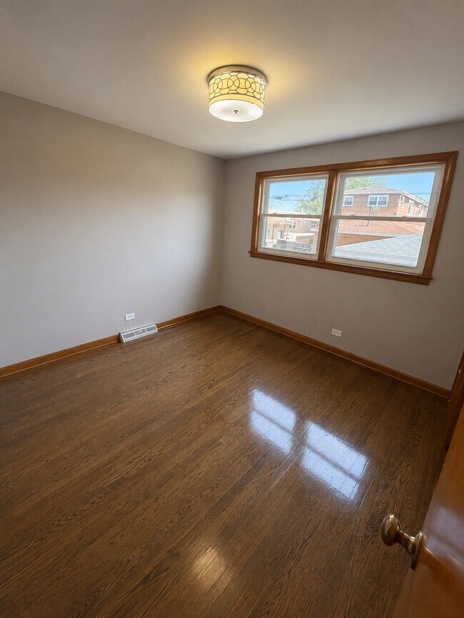 Building Photo - 11251 S Ave L