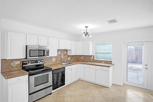 Building Photo - 651 NE 59th Ct