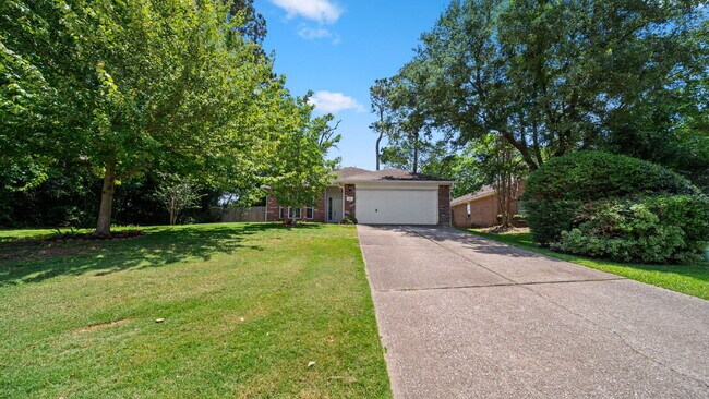 Building Photo - Move-In Ready Montgomery Home with Fenced Yard & Mature Trees!