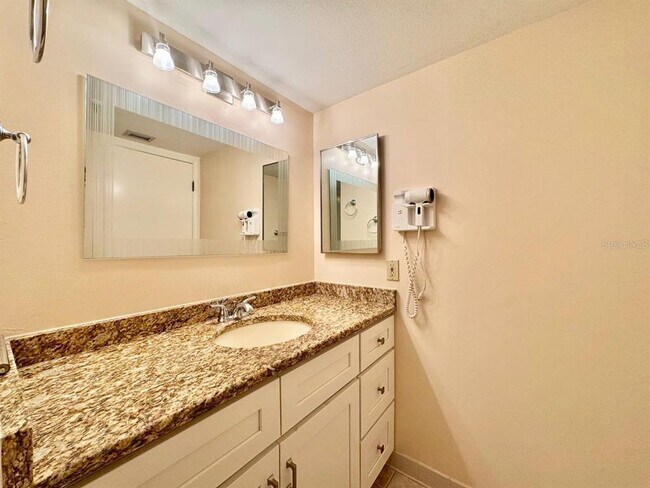 Building Photo - 5950 Pelican Bay Plaza S