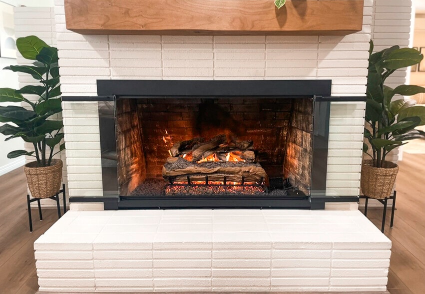Indoor Fireplace updated with glass bi-fold doors - 4746 W 159th St