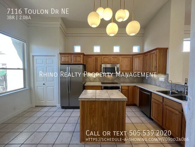 Building Photo - 7116 Toulon Dr NE