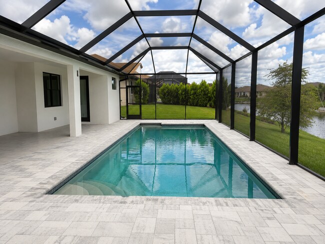 Building Photo - Move In Special! Pool Home with Canal View